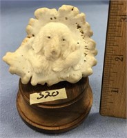 2 1/2" relief carving of a puppy and a bird mounte