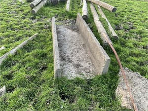 Smaller concrete “J” bunk cattle feeder