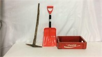 Antique pick, snow shovel, Coke case
