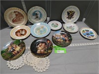 Collector plates and 3 starched doilies