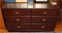 Cherry finished six drawer dresser base with glass