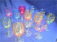 12 various coloured wine glasses