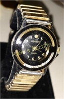vintage revlon floating diamond dial watch