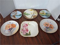 6 decorative plates. All are made in occupied