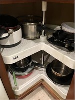 Contents of lazy susan cabinet-skillets, pots &