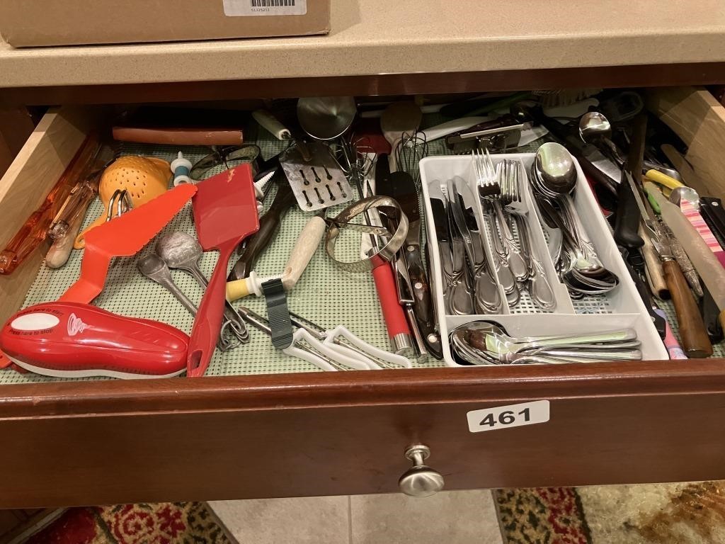 Contents of cabinet drawer - utensils, flatware