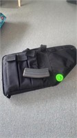 GUN CASE AND CLIP WITH BULLETS