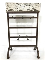 Rustic metal stand with hangers