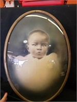 Antique oval brass framed baby 14x20"