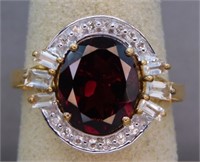 STERLING SILVER RING WITH GARNET. SIZE 8.5.