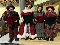 Four Christmas Carolers