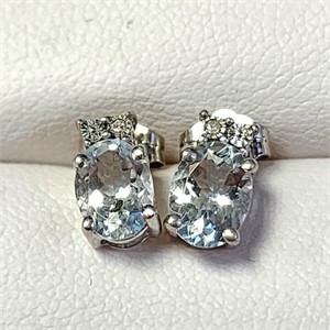 $240 Silver Blue Topaz And Diamond  Earrings