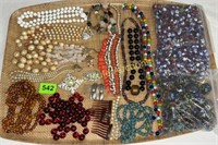 Beads, necklaces, hair combs, brooches