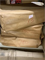 Three packs of brown grocery bags