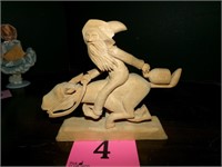 CARVED WOODEN DRUNK ON A HORSE