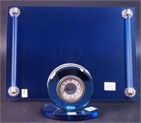 A blue dresser tray with blue rod handles