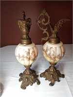 Pair of Cast Iron and Brass Pitchers