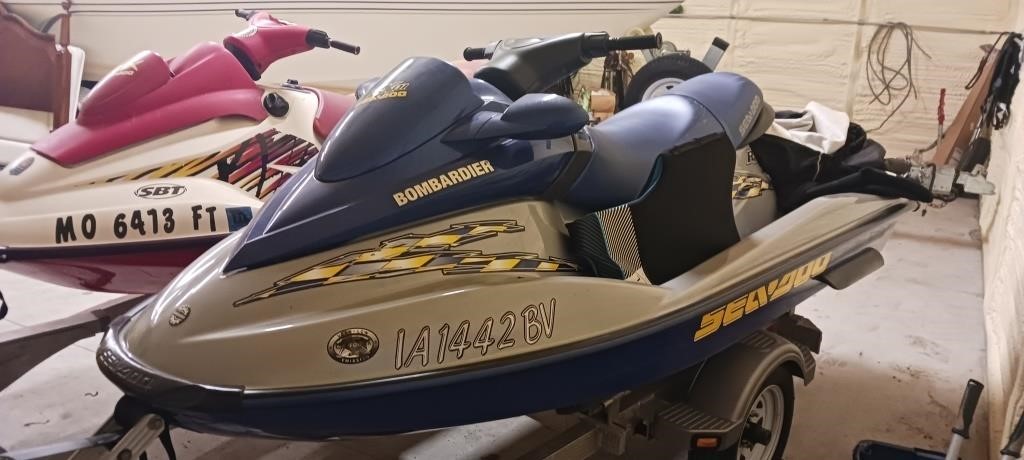 1996 and 2002 seadoo gsx ,rxdi with double trailer