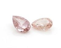 Two loose pink diamonds with certificates
