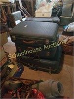 Group of 3 blue vintage suitcases