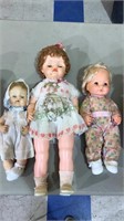Three vintage baby dolls the tallest one is that