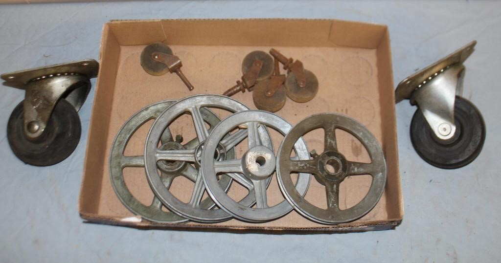 Assortment of pulleys and two heavy duty casters