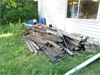 Large Pile of Scrap / Firewood behind shop