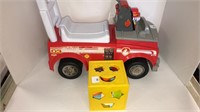 (1) jakks toy firetruck (1) form fitter toy block