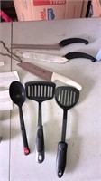 Kitchen utensils, knives and plastic shelf