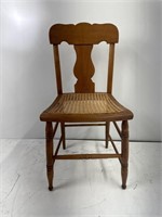 Antique Maplewood  cane chair.