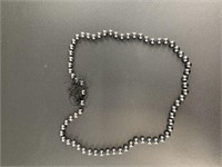 String of tied hematite beads measuring 17in in le