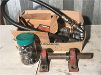 Box of bearings, brackets, hydraulic hose and