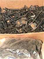 Box of assorted plastic swather pick up teeth.