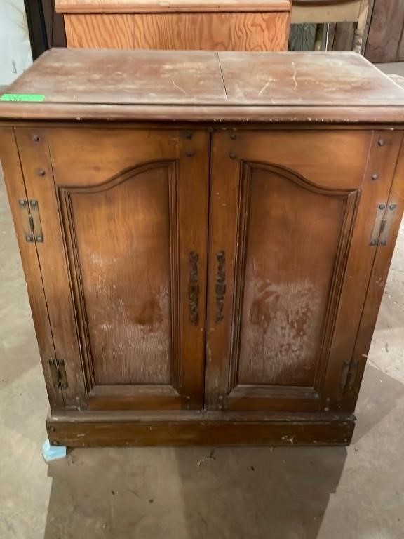 1940s Magnavox record player cabinet. Basement.