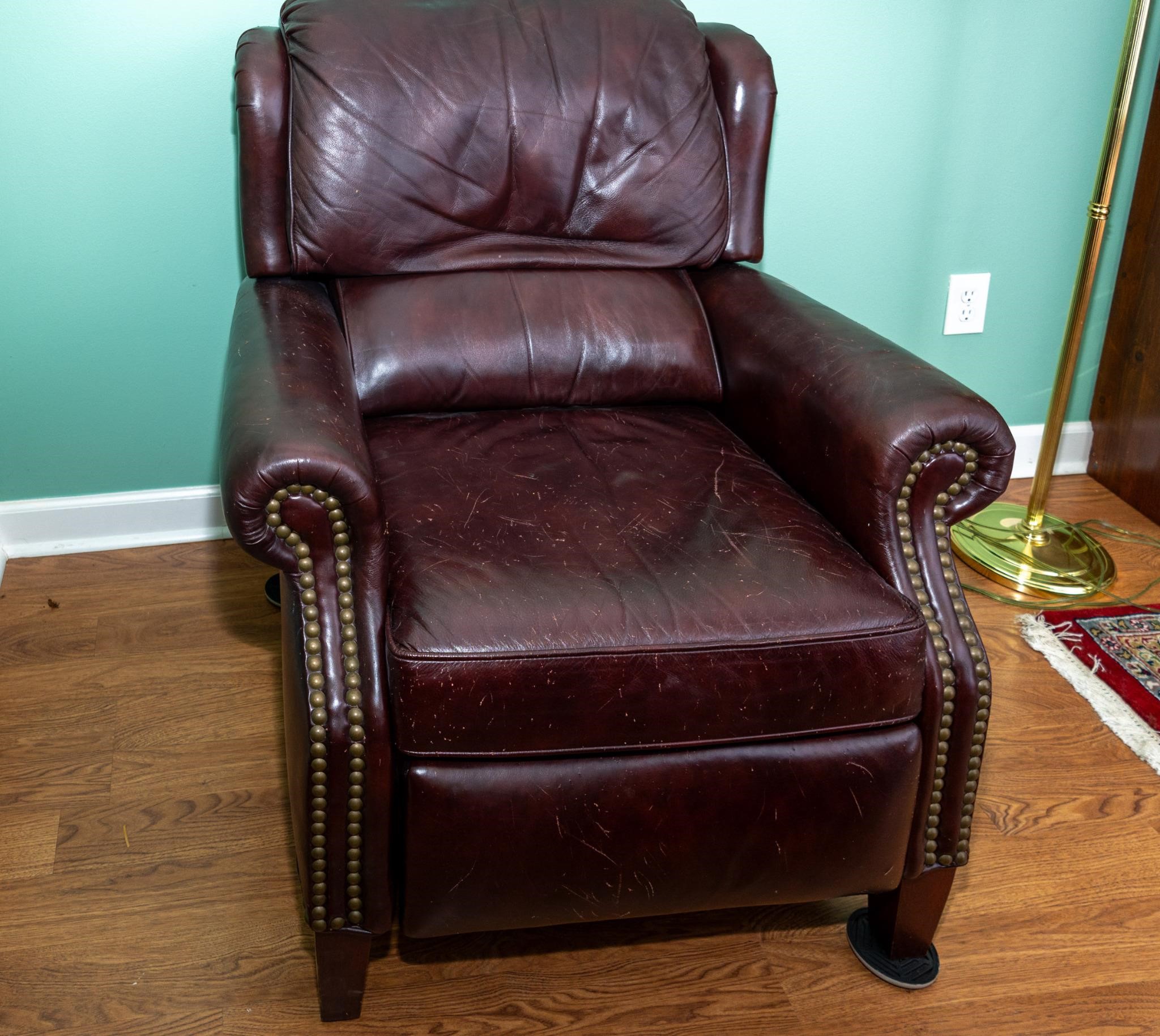 Vintage brown leather reclining wingchair