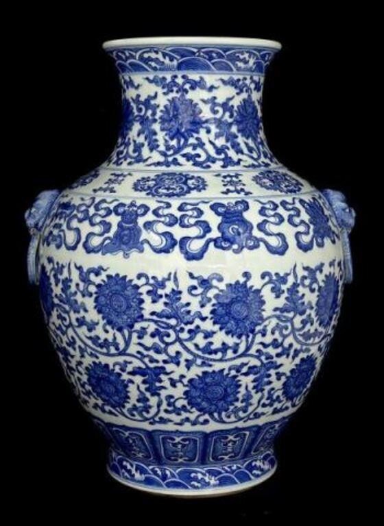 Ornate Blue & White Chinese Vase w/ Lion Handles.