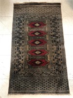 Hand made Oriental rug 29x53