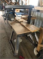 Craftsman 10" radial saw on work stand/wheels