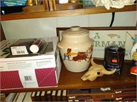 Shelf lot with auburn man and miscellaneous