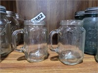 2 GLASS JARS WITH HANDLES