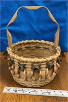 F1)  Basket, handmade by local artist. Very nice