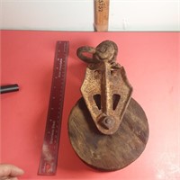 Metal and wooden pulley