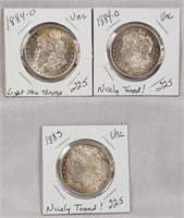 (2) 1884-O, ‘85 Dollars  BU – Toning