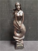 Carved wood mermaid statue