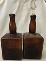 Pair of vintage brown glass cook and Bernheimer