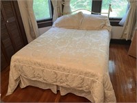 Brass look full size bed. Includes bedding.