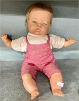 VINTAGE BABY DOLL IN RED OVERALLS