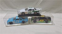 3 vintage die-cast nascars in cases