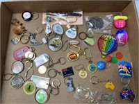 Souvenir assortment of keychains, including