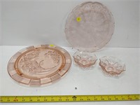 pink coloured glass trays and bowls